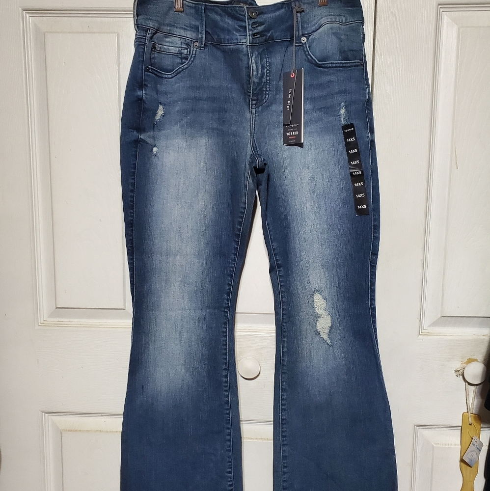 Torrid distressed bootcut jean.  Extra short 14
